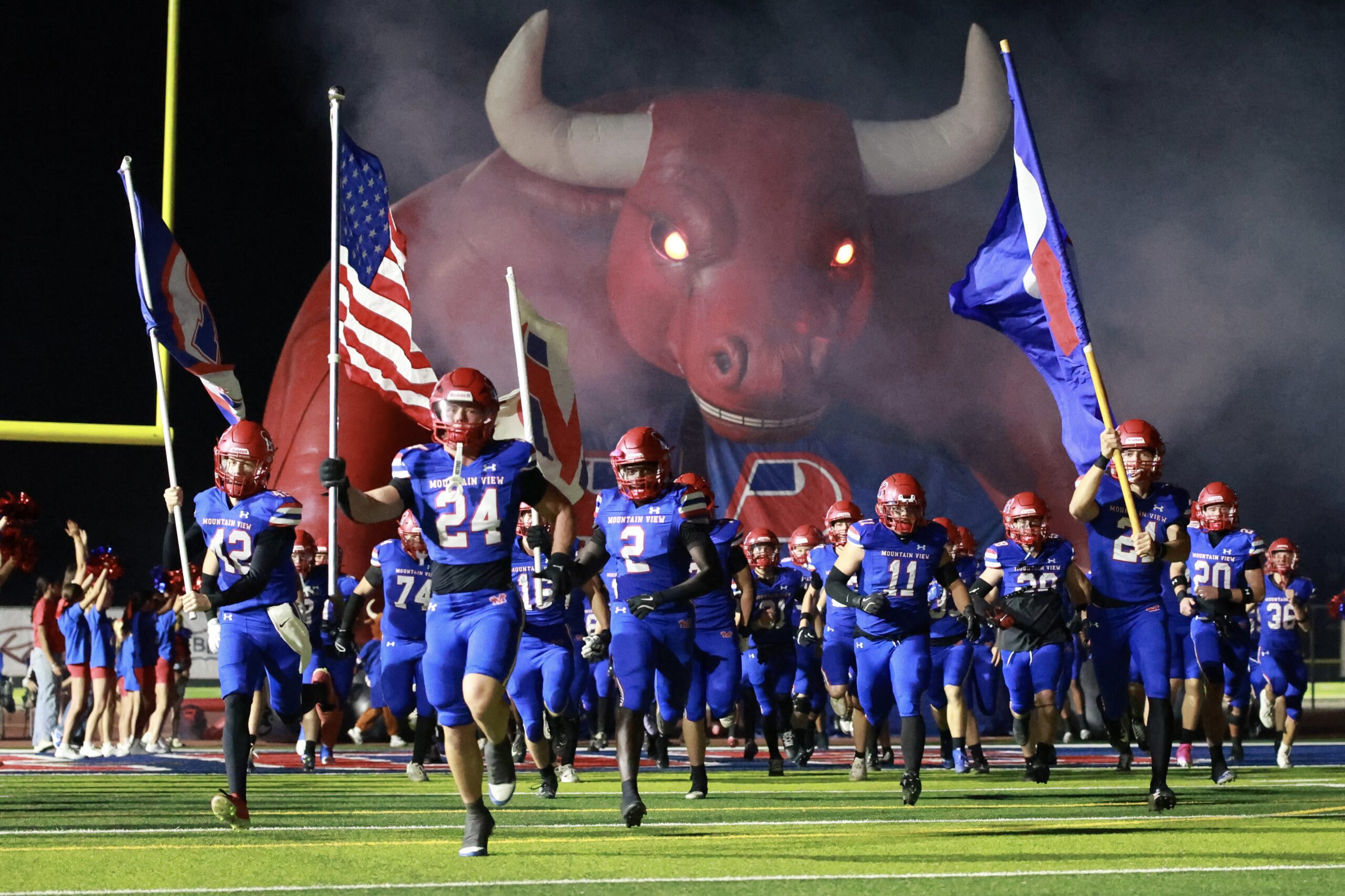 Mountain View Toro Football coaches and players on the sideline